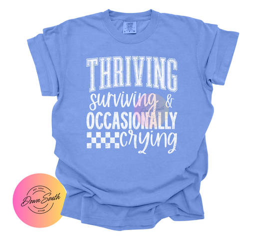 Thriving, surviving, and occasionally crying women’s tee